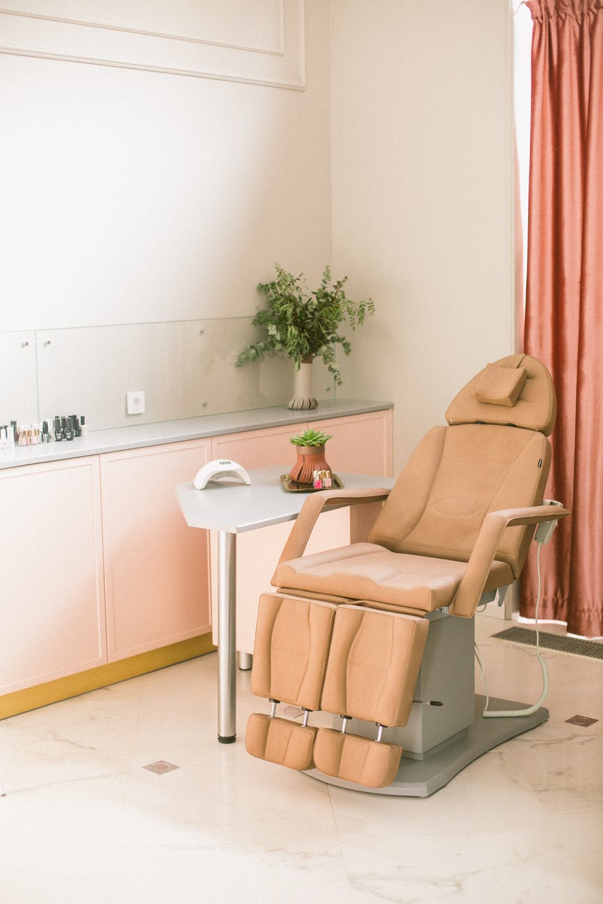 comfortable procedure chair in stylish manicure studio